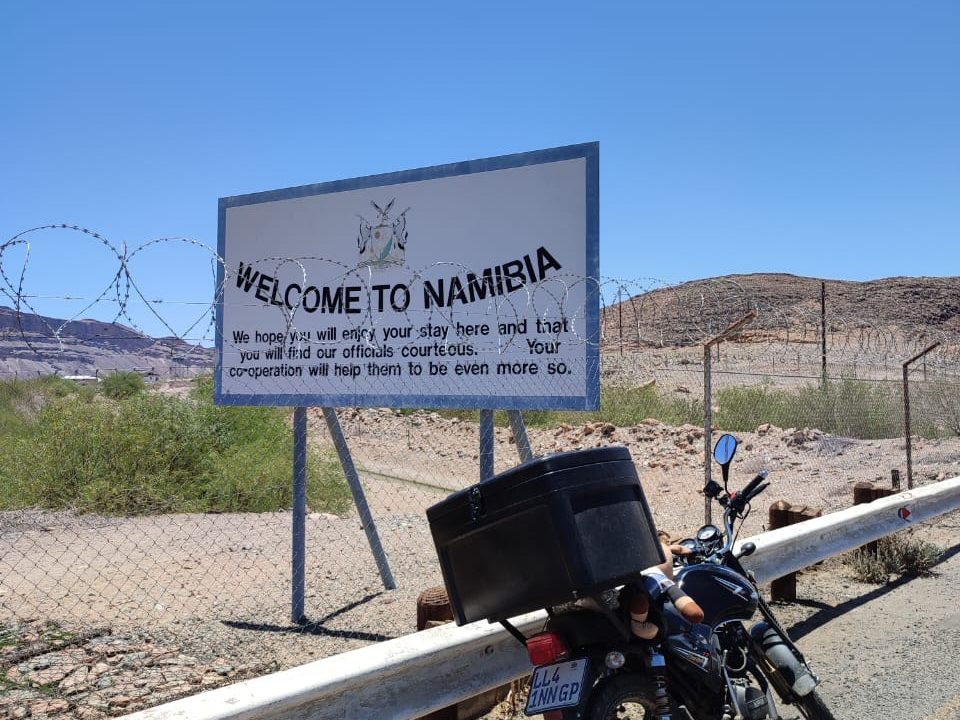 The Nippon 150 at the Welcome to Namibia border sign